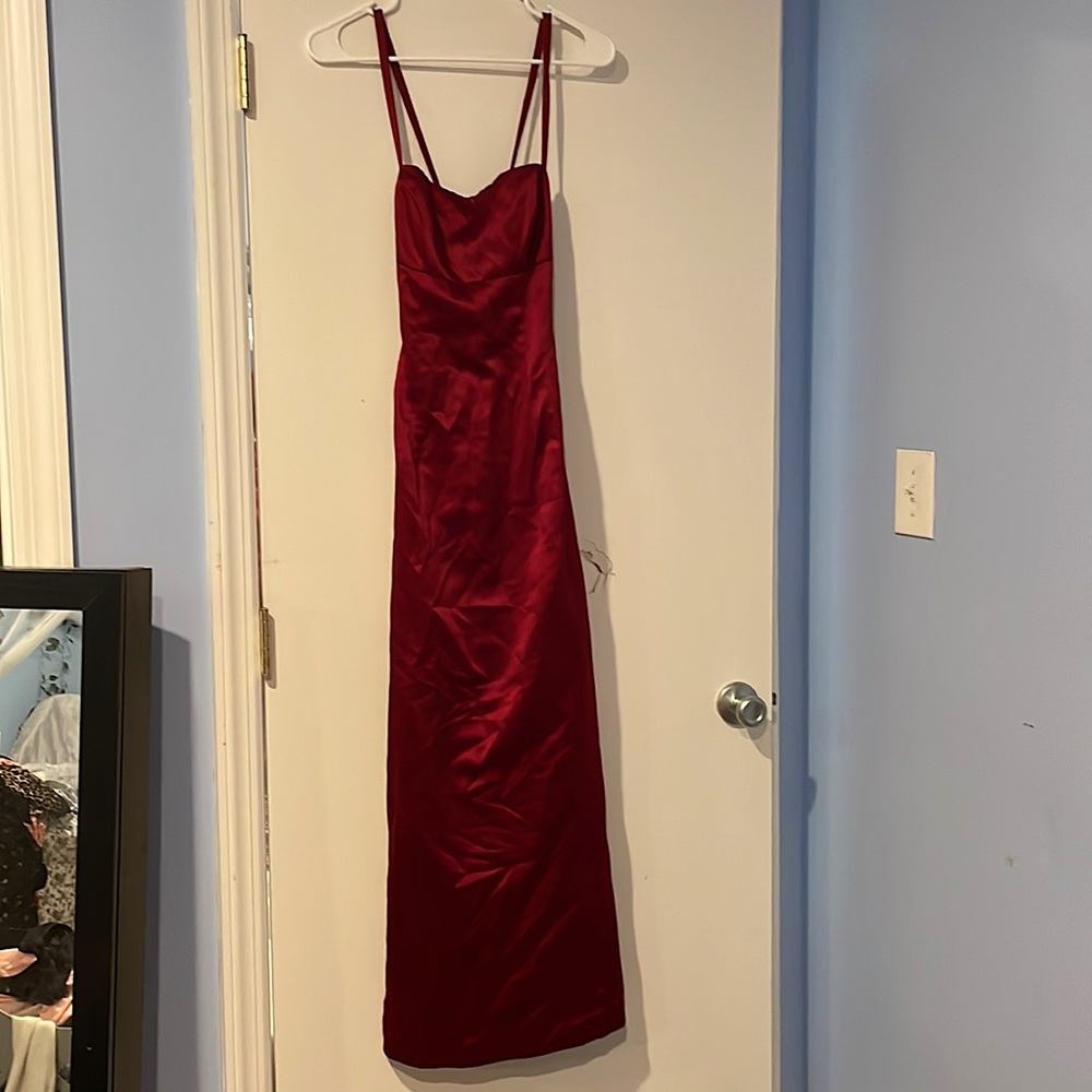 Tight red prom/special event dress.